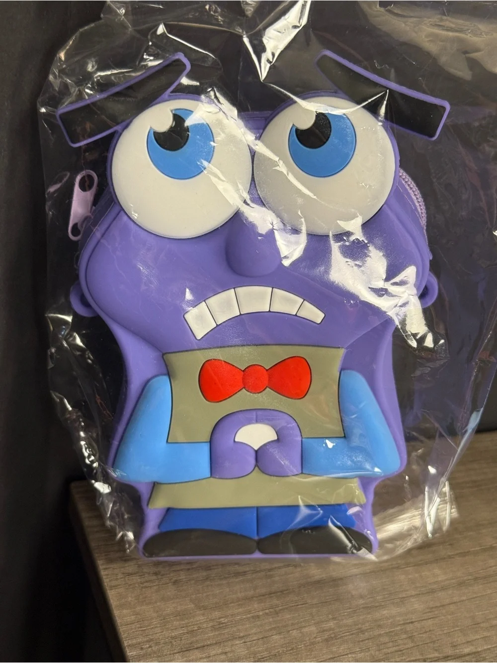 All 9 Inside Out 2 emotions characters as crossbody coin bags